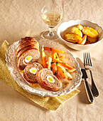 Festive Meatloaf with Egg Stuffing and Bacon Wrapping