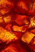 Sparkling cola with ice cubes (detail, full picture)