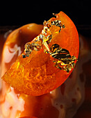 Tangerine confit with gold leaf