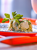 Fish mousse with scallops and herbs