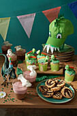 Dinosaur muffins, Stone Age cream and explorer cookies for the dinosaur party