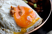 Fried egg on nasi goreng (close-up)