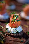 Salmon with horseradish cream on pumpernickel