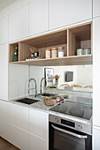 Modern, white fitted kitchen cabinets