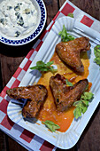 Hot Buffalo wings with blue cheese dip