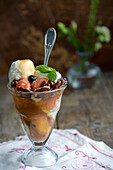 Sundae with grilled peaches, spicy pecans and bourbon caramel