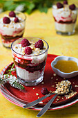 Fresh raspberries with whipped cream, honey and toasted oats (cranachan)