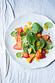 Vegan spinach salad with strawberries