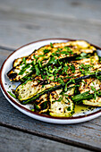 Grilled courgettes with herbs