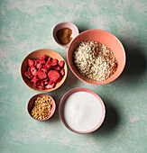 Ingredients for vegan porridge with frozen strawberries