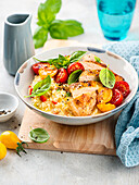 Paprika risotto with chicken and roasted tomatoes