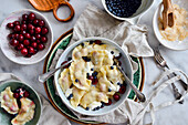 Polish dumplings with blueberries and cherries