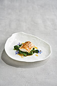 Pike perch with lupine miso, Riesling, spinach, and nut butter