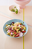 Lentil taboulé with beetroot, avocado, tomatoes and herbs