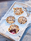 Small cherry crumble on a wooden tray