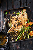 Grilled skate with green asparagus and caper butter