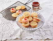 Creamy sandwich cookies with strawberry jam