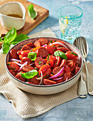 Tomato salad with chorizo