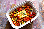 Feta tray bake roasted with peppers, tomatoes and courgettes
