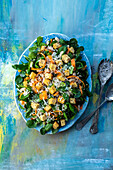Bean and carrot salad with cheese and croutons