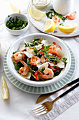 Shrimp salad with rocket, olives, and cheese