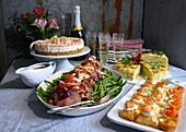 New Year's Eve menu - savoury cream cheese cake, roast, potato cake, and puff pastry