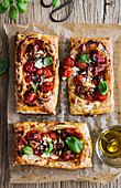 Puff pastry tarts with roasted tomatoes