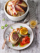 Bavarian roast beef with potato gratin and carrot vegetables