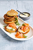 Blinis with smoked salmon and dill sour cream