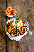 Chickpea salad with apricots and halloumi