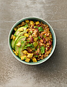 Arroz Mamposteao with avocado (rice dish with red beans, Puerto Rico)