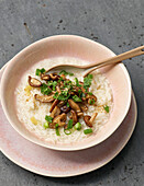 Congee with fried mushrooms
