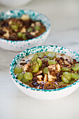 Oatmeal muesli with grapes and apple