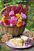 Autumn bouquet and heather in basket