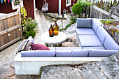 Rock garden with an outdoor living area, view of wooden terrace