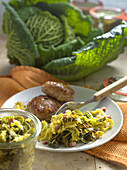 Savoy cabbage with bacon as a side dish for meatballs