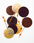 Various chocolate lollies against a white background