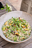 Risotto with peas, zucchini and basil