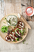 Herb ricotta with peas on toasted bread