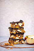 Crunchy Peanut Butter and Cornflakes Bars with Apples and Dark Chocolate Topping