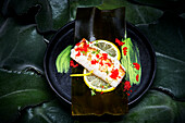 Cod fillet with seaweed and flyfish roe
