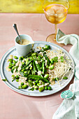 Pea and bean medley with a ginger marinade and fried rice noodles