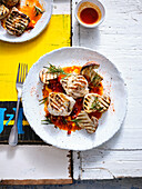 Grilled monkfish with chorizo sauce and porcini mushrooms