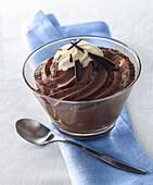 Dark chocolate mousse in a glass bowl