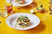 Tortilla stack with vegetables and guacamole