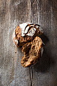 Tauern rye bread, broken up on a wooden base