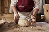 Shaping dough into ball