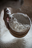Flour being sieved