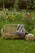 Rattan bench and side table in the yard