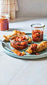 Smoky red pepper relish with crispy chicken fingers